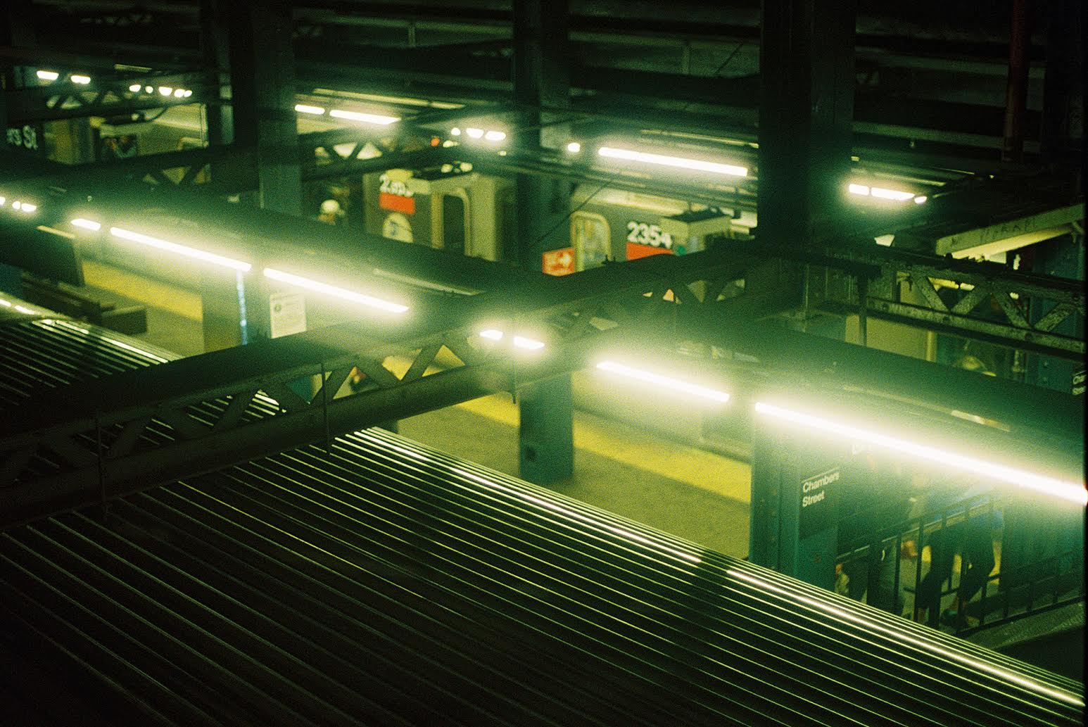 A color photograph of a subway station.